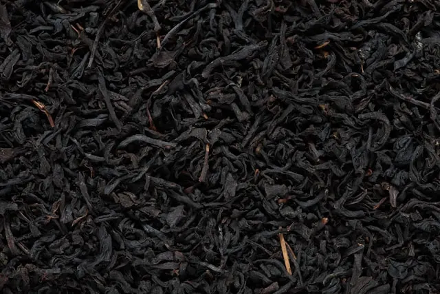 Up close photo of dried-up black tea leaves