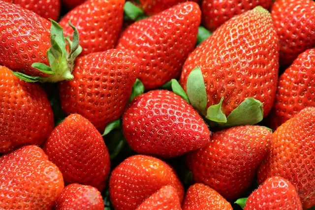 A pile of beautiful red strawberries